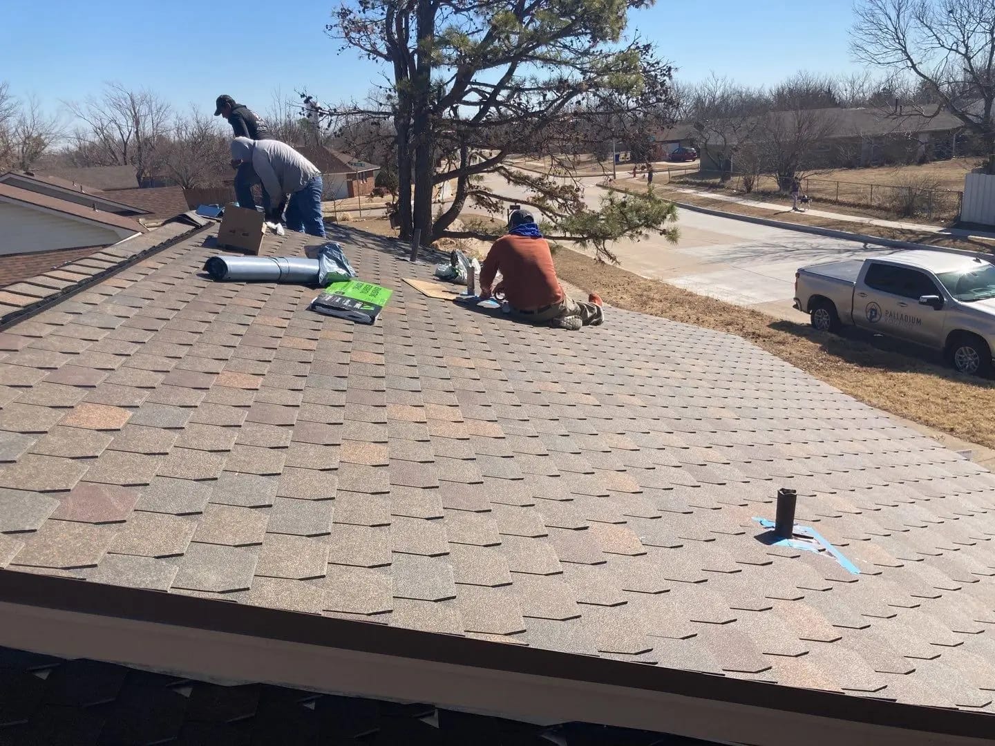 Contractors working on roof
