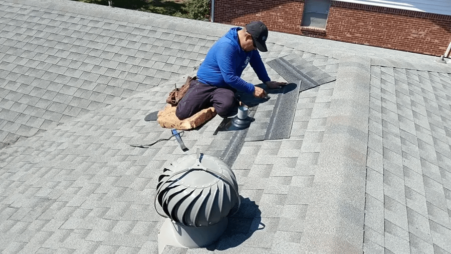 Roof repair work on shingle roof by Palladium Roofing