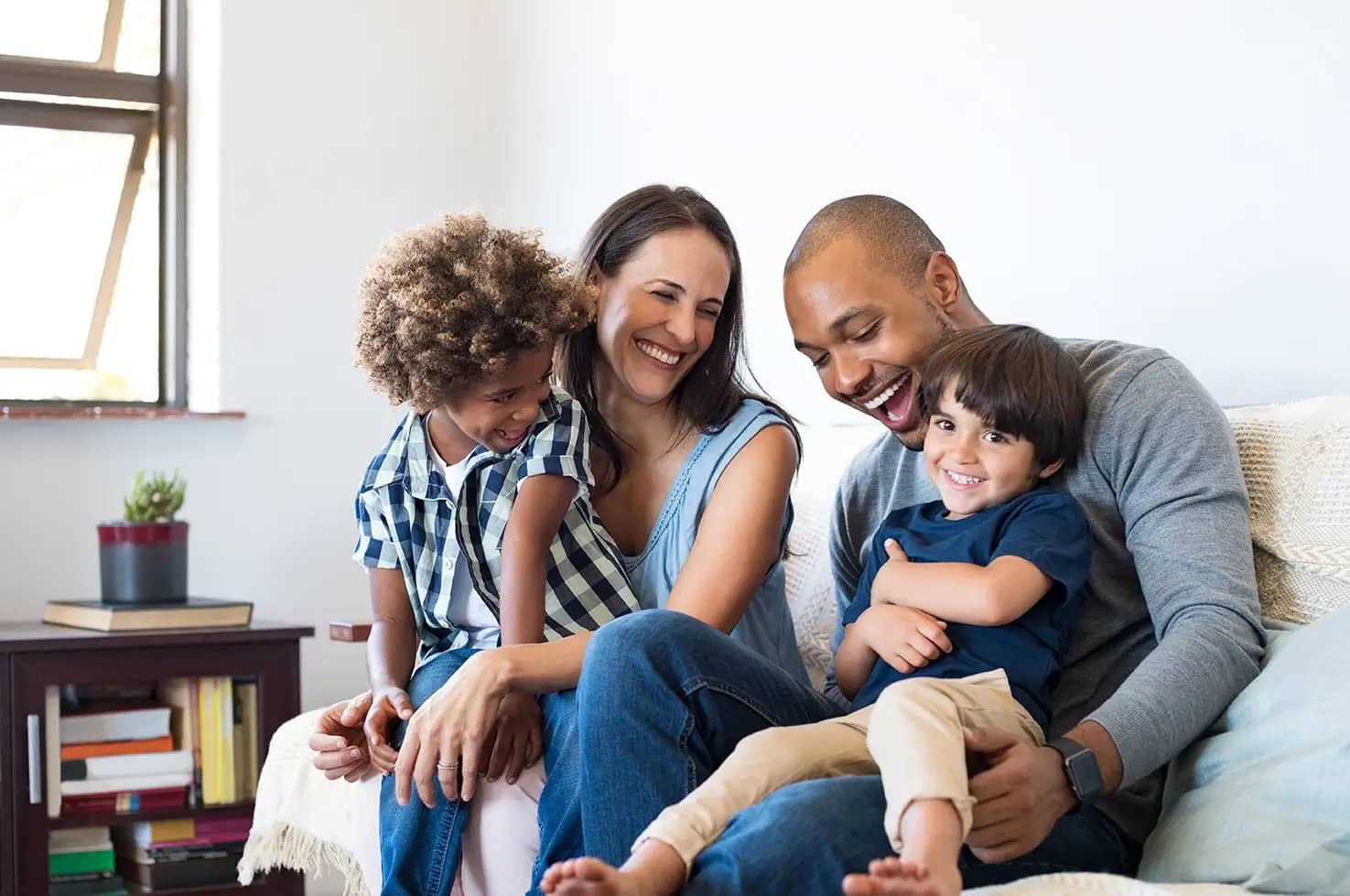 Happy young family at home