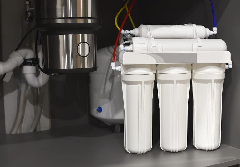 whole house water filter-close up of under sink water filtration system