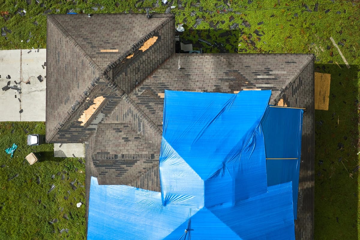 tarping roof shingle damage