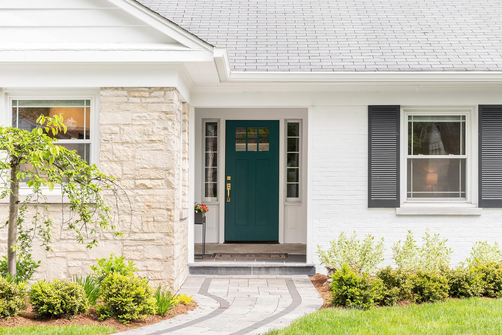 energy efficient doors-fiberglass door on white brick house