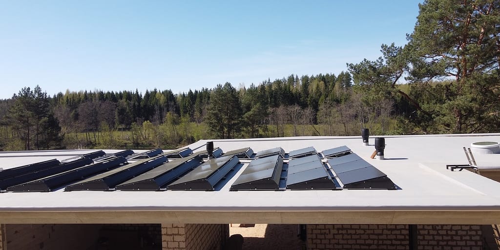 solar panels angled on flat roof