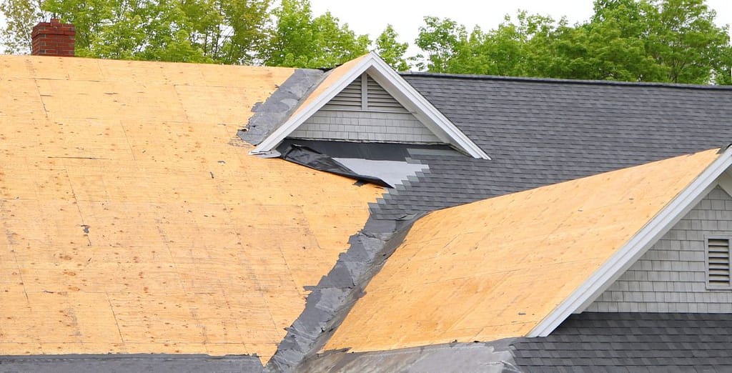asphalt shingle roof being replaced