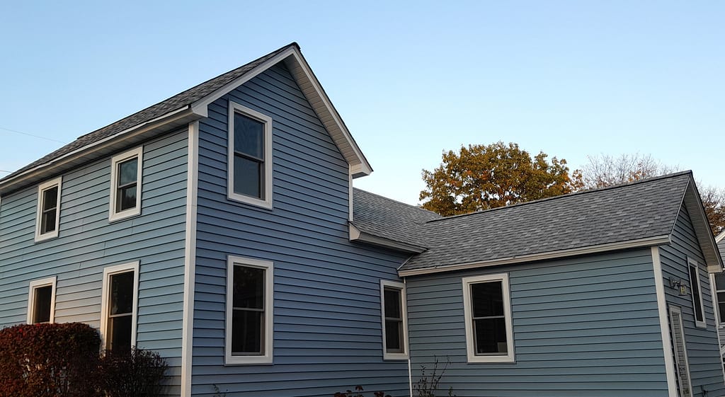 Pella windows on a blue house