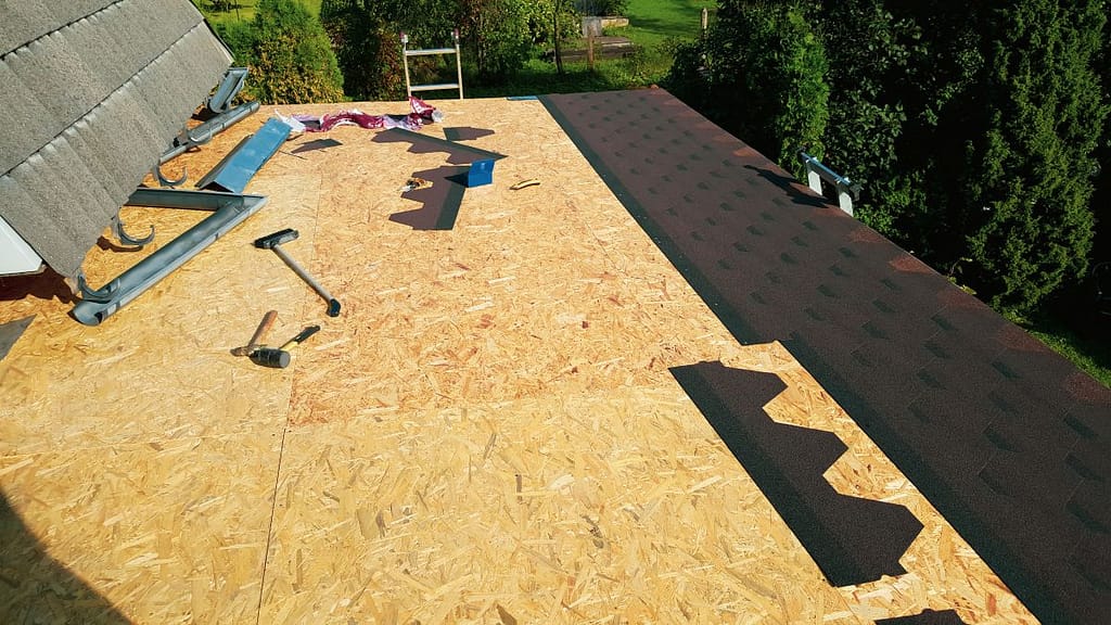 roof being replaced with new shingles