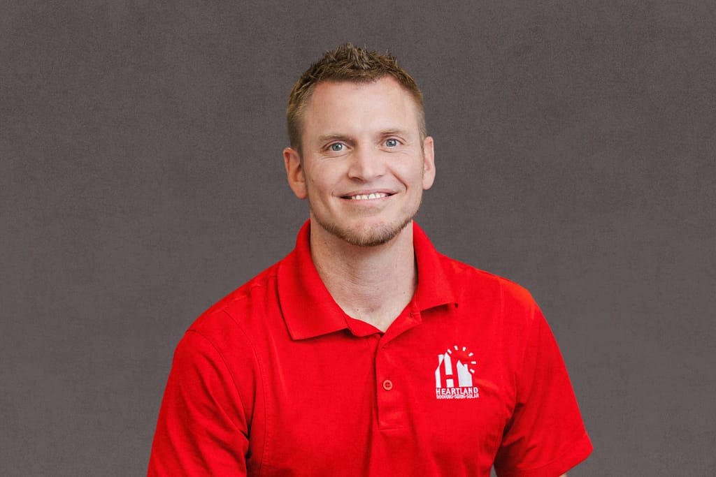 adam olson headshot-heartland roofing-des moines