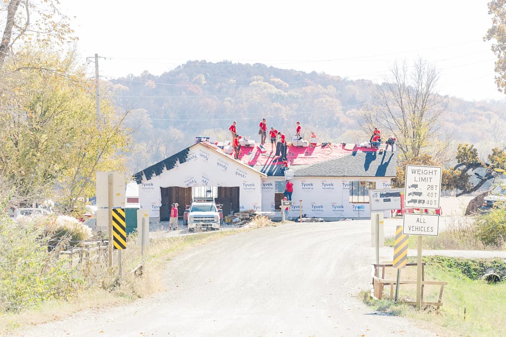 crew on roof far-heartland roofing-des moines