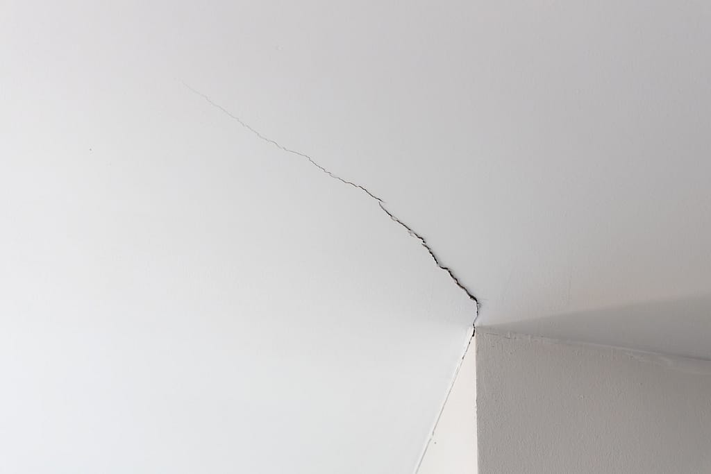 crack in ceiling indicates sagging roof