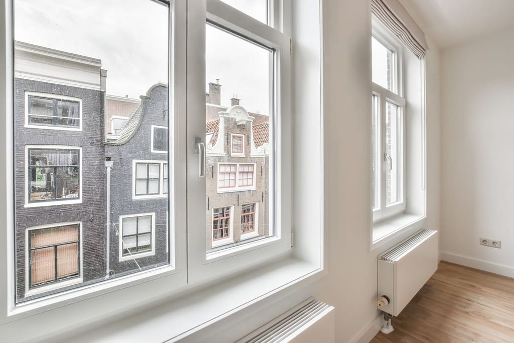 energy efficient windows white wall and frame view inside apartment