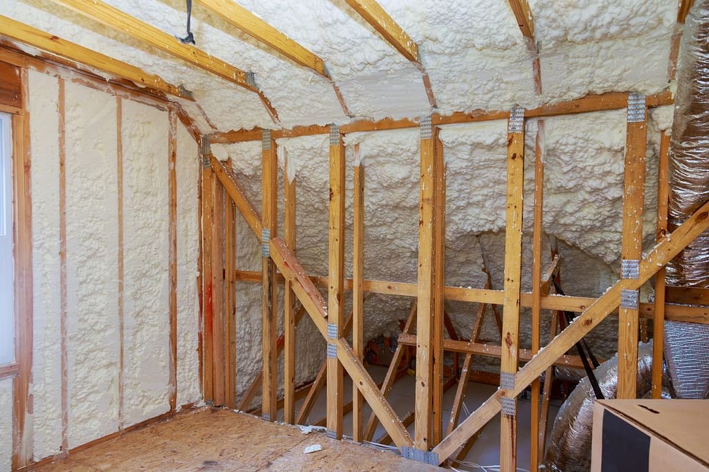 attic with newly installed foam insulation