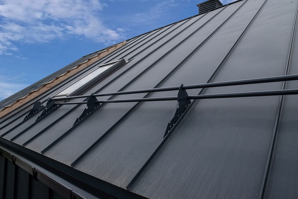 Snow Guard Railing for Metal and Wood Roofs on standing seam metal roof