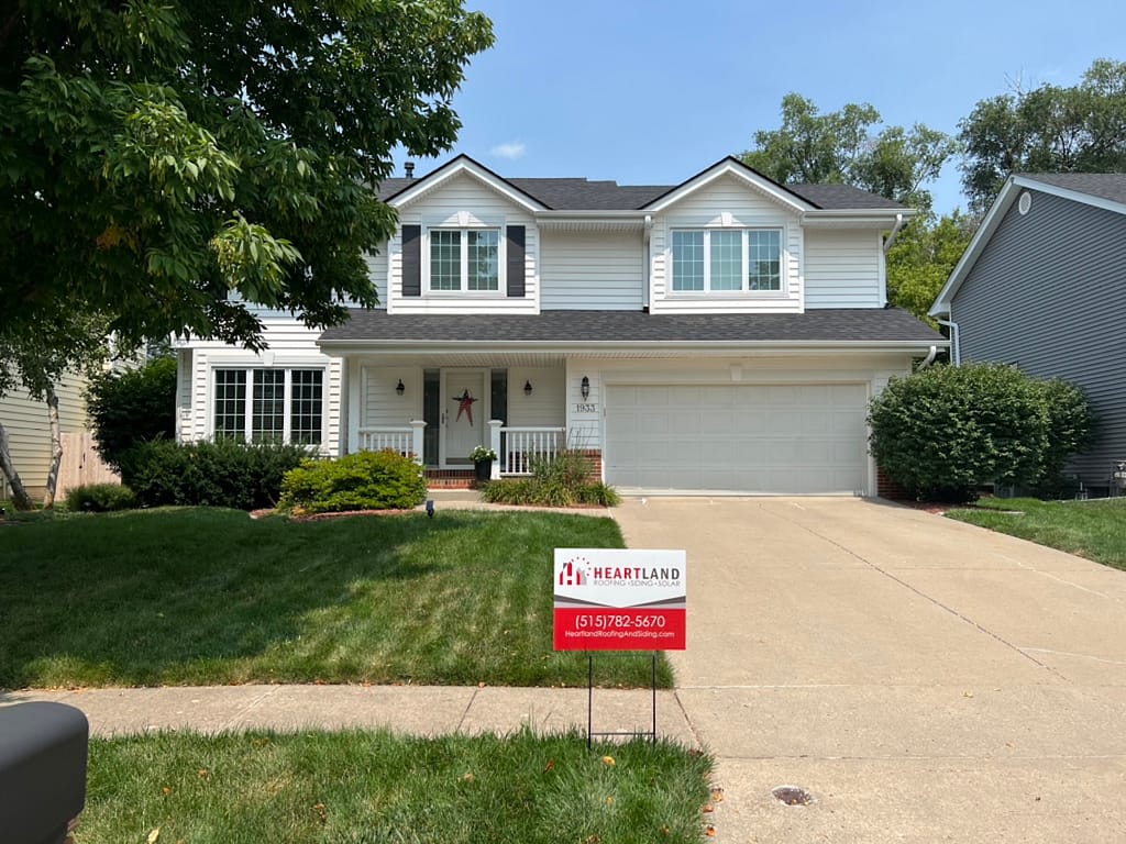 Heartland Roofing, Siding, and Solar roof project with IKO Dynasty AR shingles in Granite Black