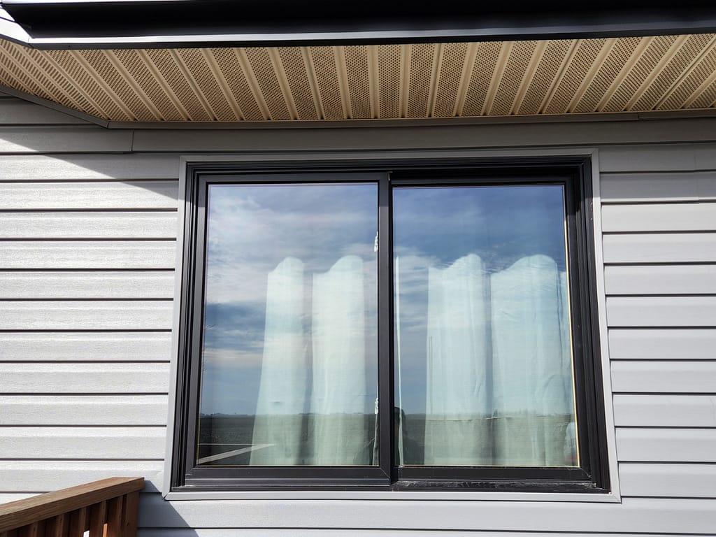 Marvin Elevate Series window replacement on an Iowa home, installed by Heartland Roofing, Siding, and Solar.