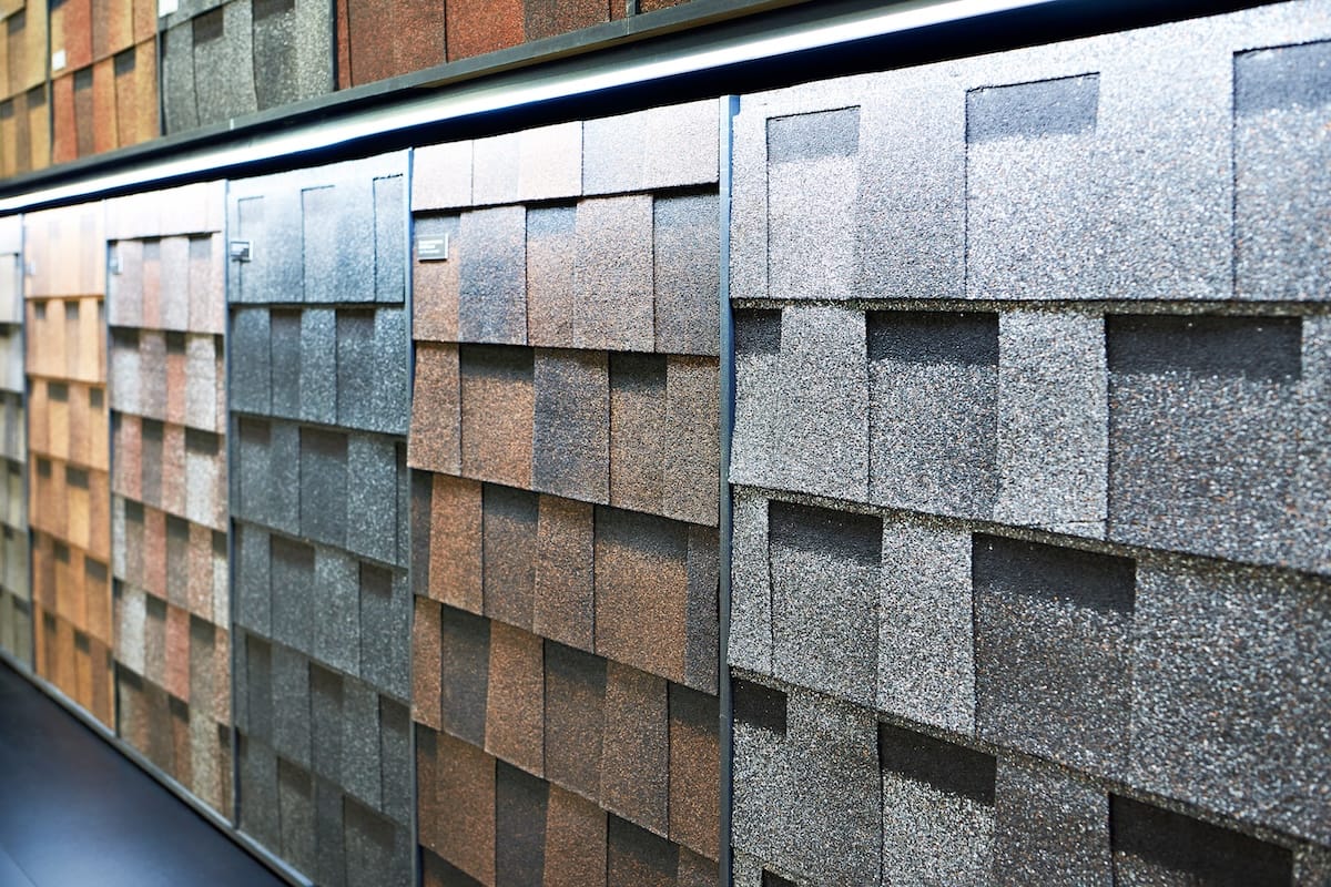 Laminate roof tiles for decorative finishing on display in store