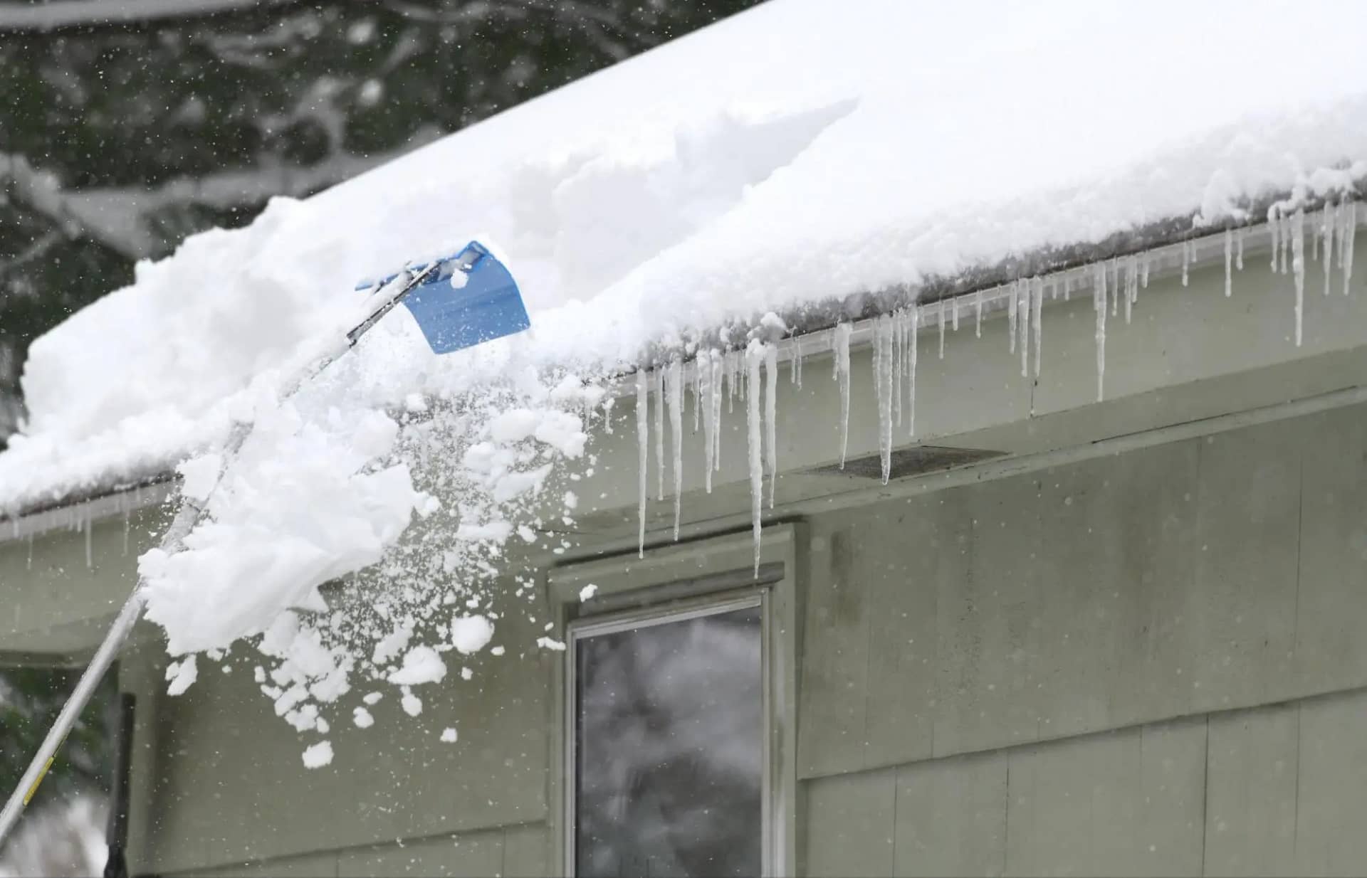 Does Roof Raking Prevent Ice Dams? (homeowner's Guide)