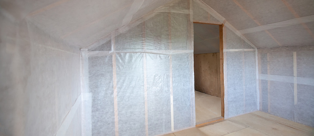 Empty room with plastic sheeting walls