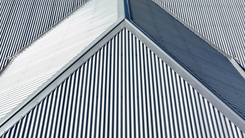 Drone aerial photograph of a grey coated corrugated iron roof