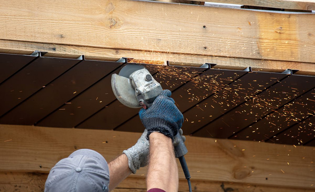 how to install soffit vents worker using cutter to cut vents