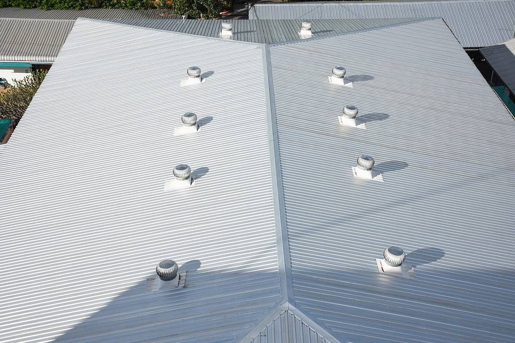 Beautiful gray metal sheet roof in commercial construction.