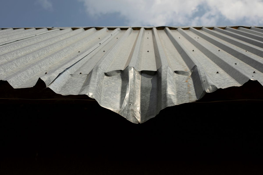 damaged metal roof