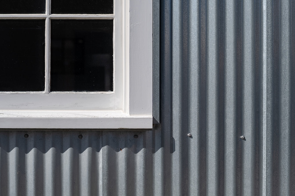 window with metal siding