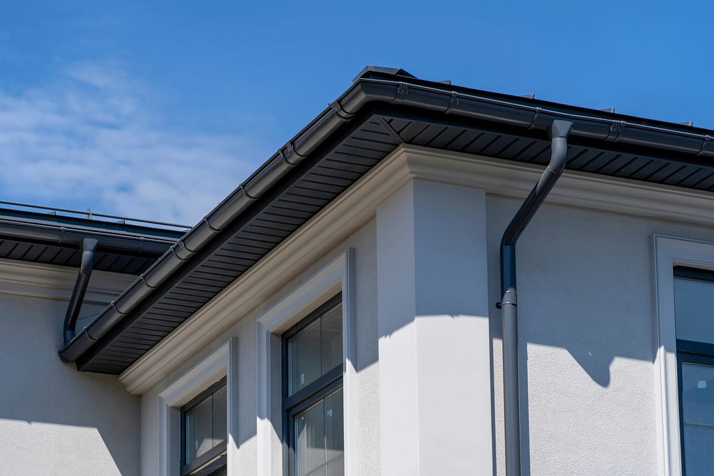 black gutters and downspout