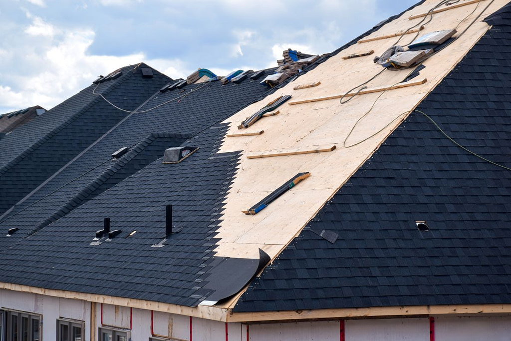 roof replacement cost Albert Lea MN dark blue shingles replacement big roof