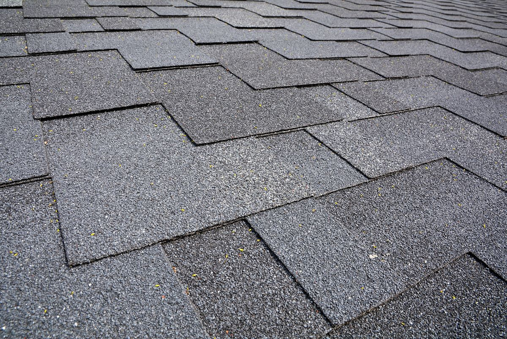 closeup of dark asphalt shingles
