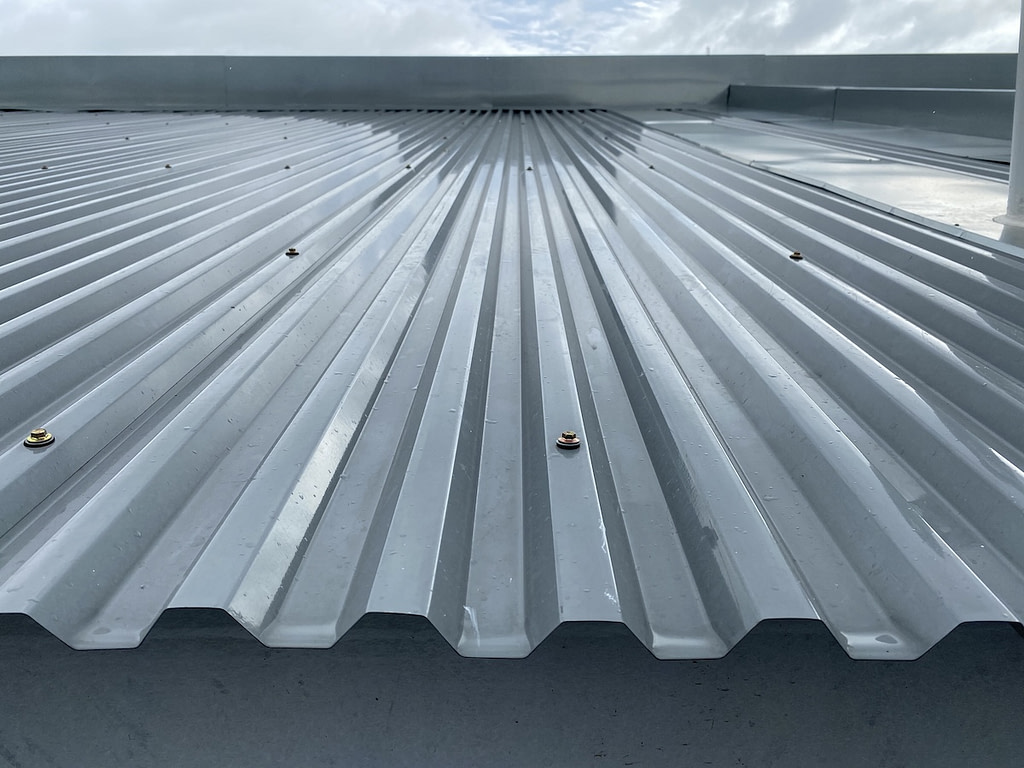 Close up of a corrugated metal roof system