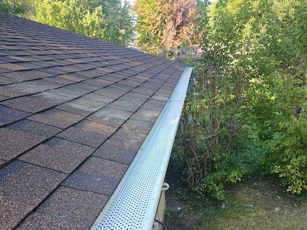 a clean gutter with a gutter guard