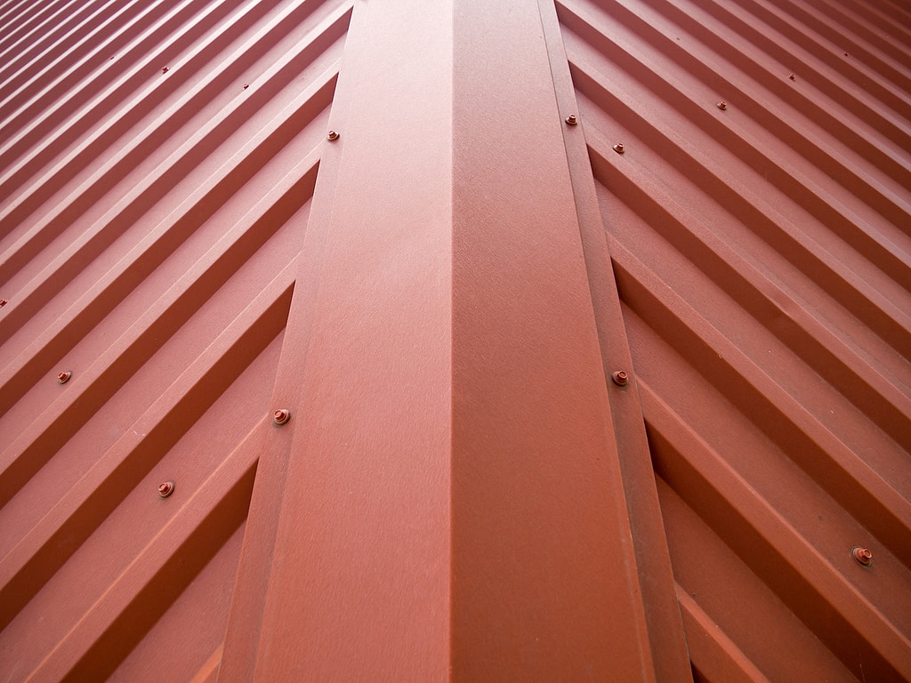 Fragment of roof covered with a metal gofrolist