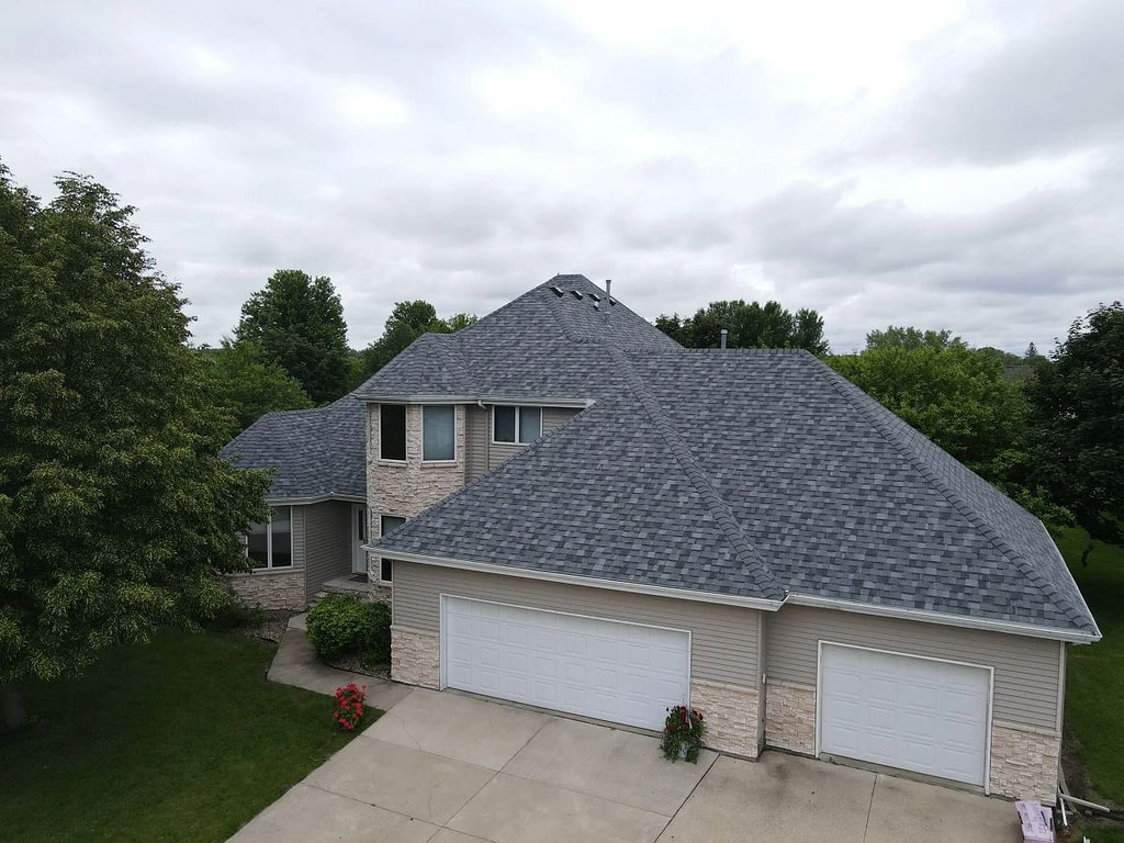 when does a roof need to be replaced grey shingles Young Construction project