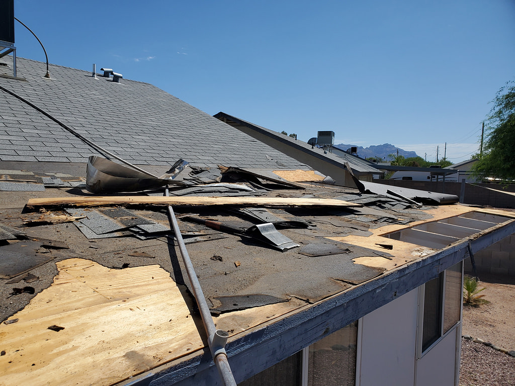 Damaged Roofing Material on Single Family Home, Roof Replacement. High quality photo