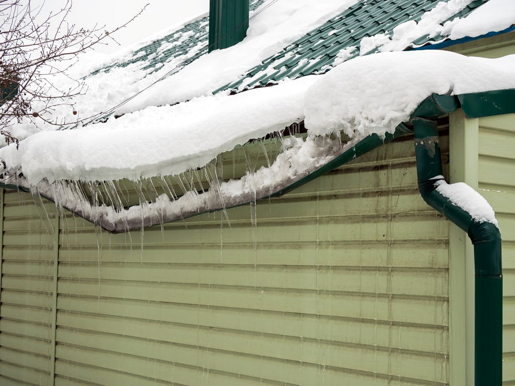 poorly insulated attic ice dams