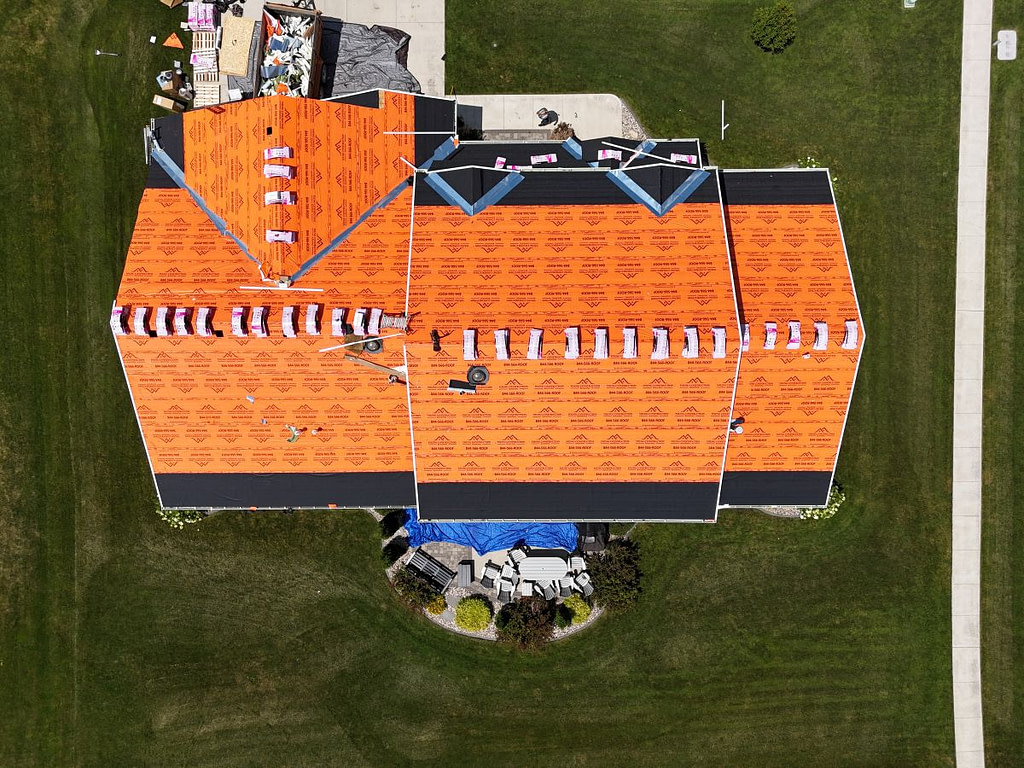 Aerial view of a roof replacement in progress