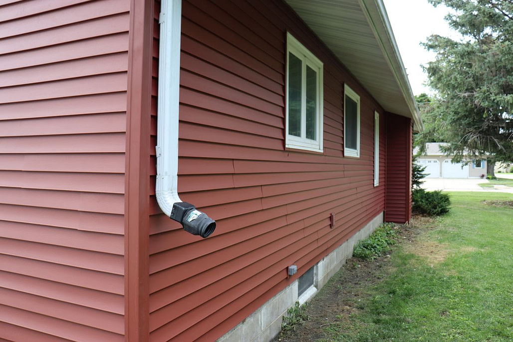 Red newly installed siding