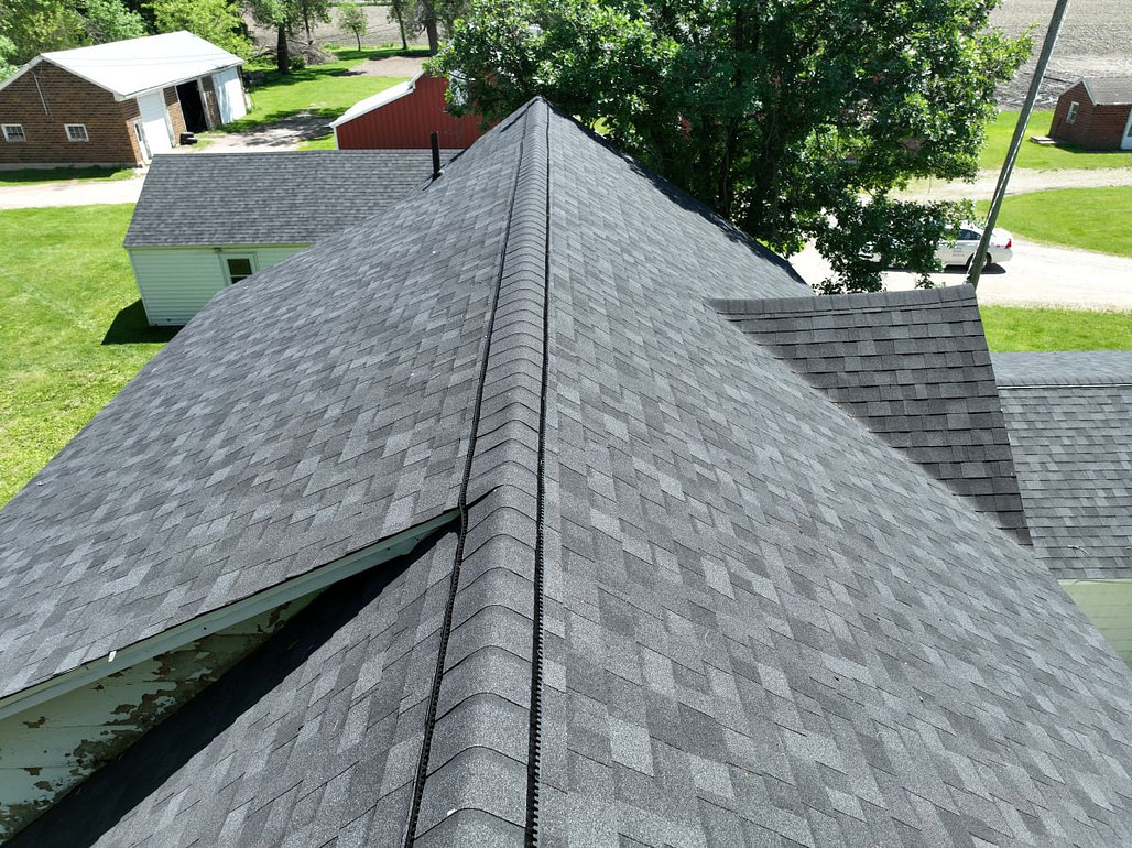Close-up of a grey shingle roof