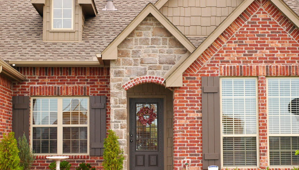 types of siding-brick and stone siding on a house