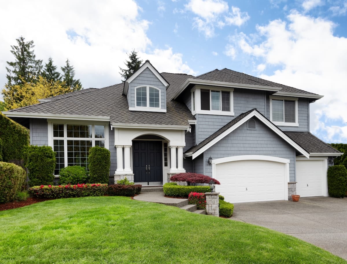 Family home with new asphalt roofing
