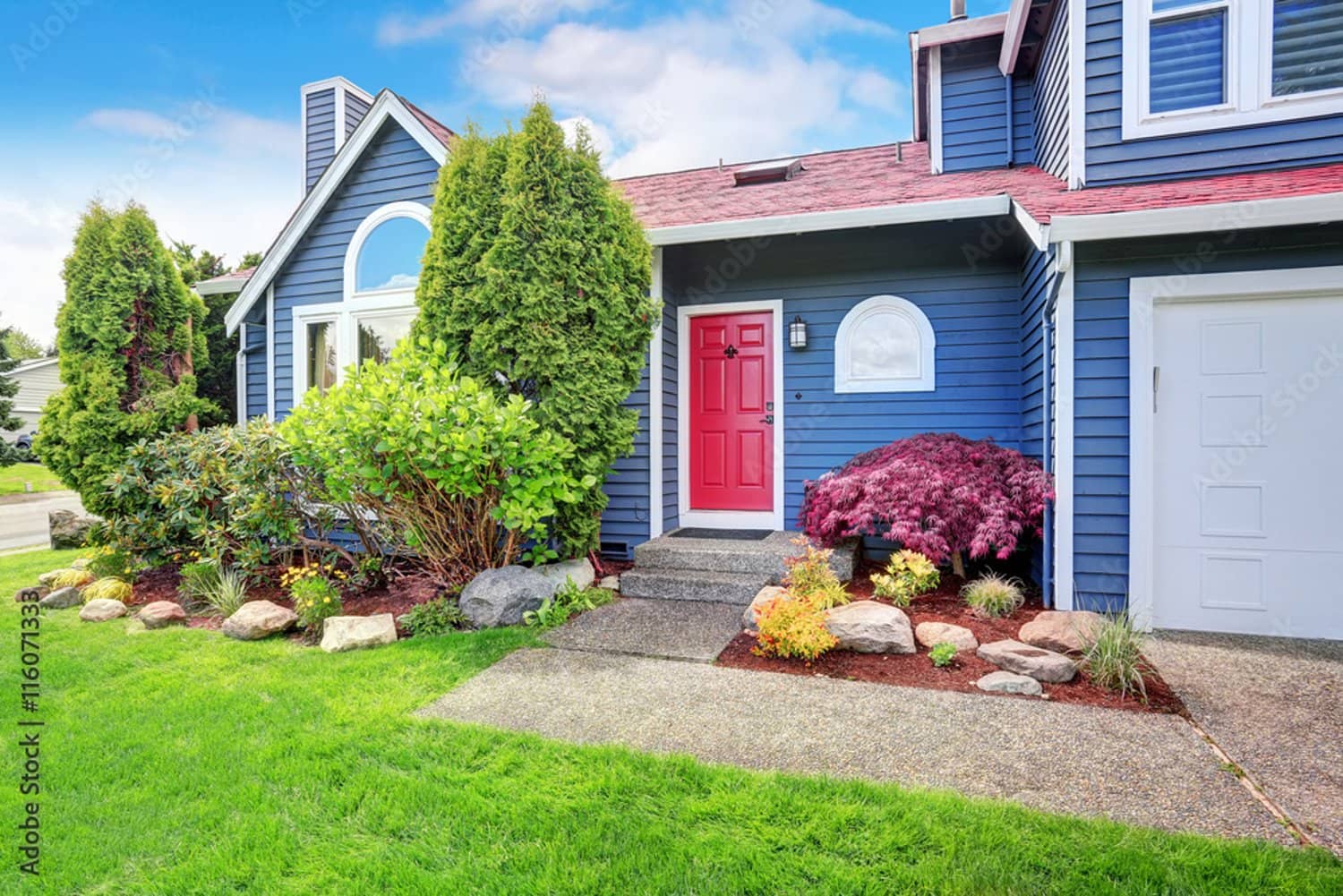 a beautiful house with greenery