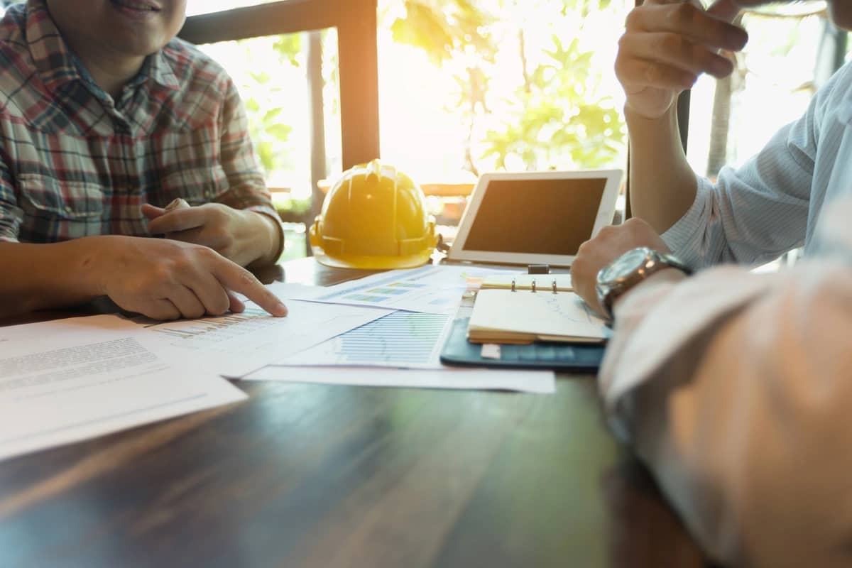 talking with a roofing contractor