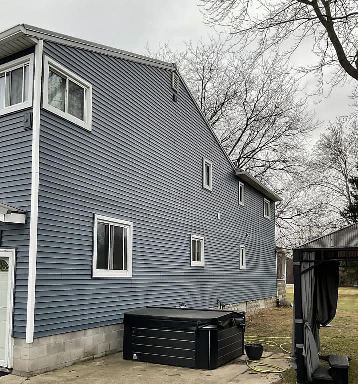 rowland siding project after shingle and metal installed new siding