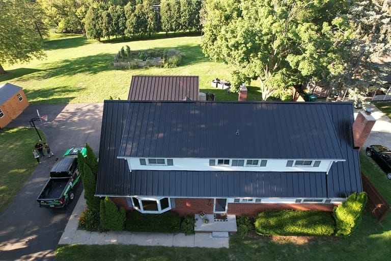 front view of roof replacement after metal installation