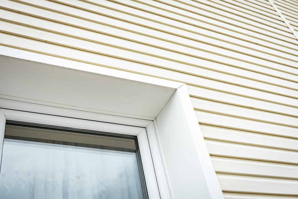 vinyl siding installed on home in beige