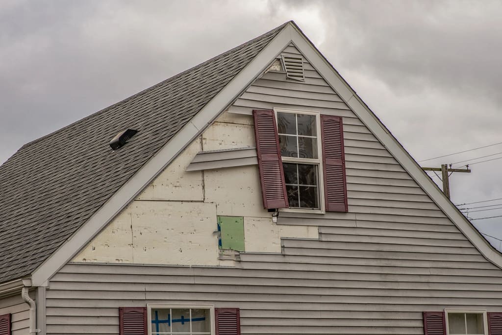 wind damaged home
