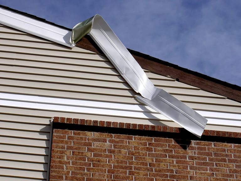 wind damage siding home