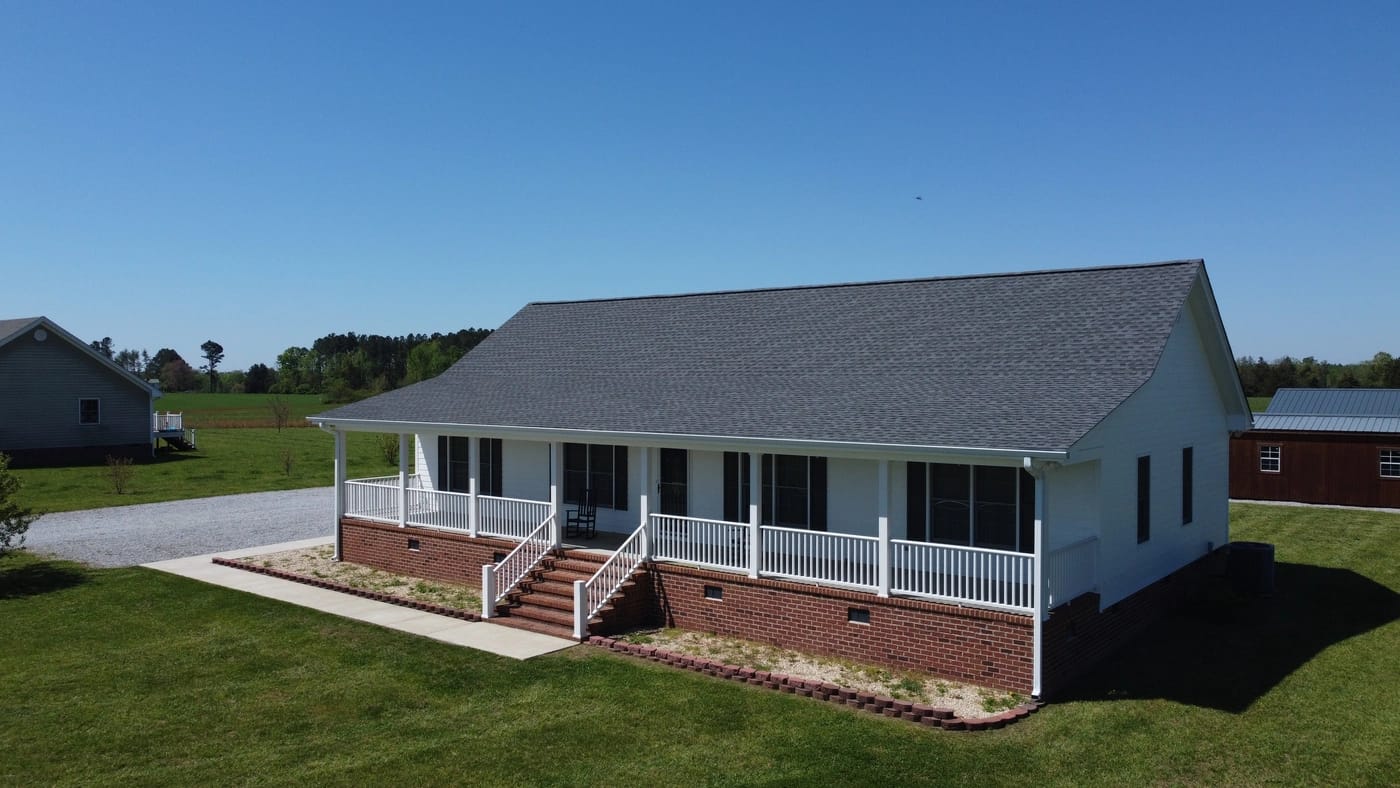 front side view of one story residential home with new shingle roofing system in richmond va