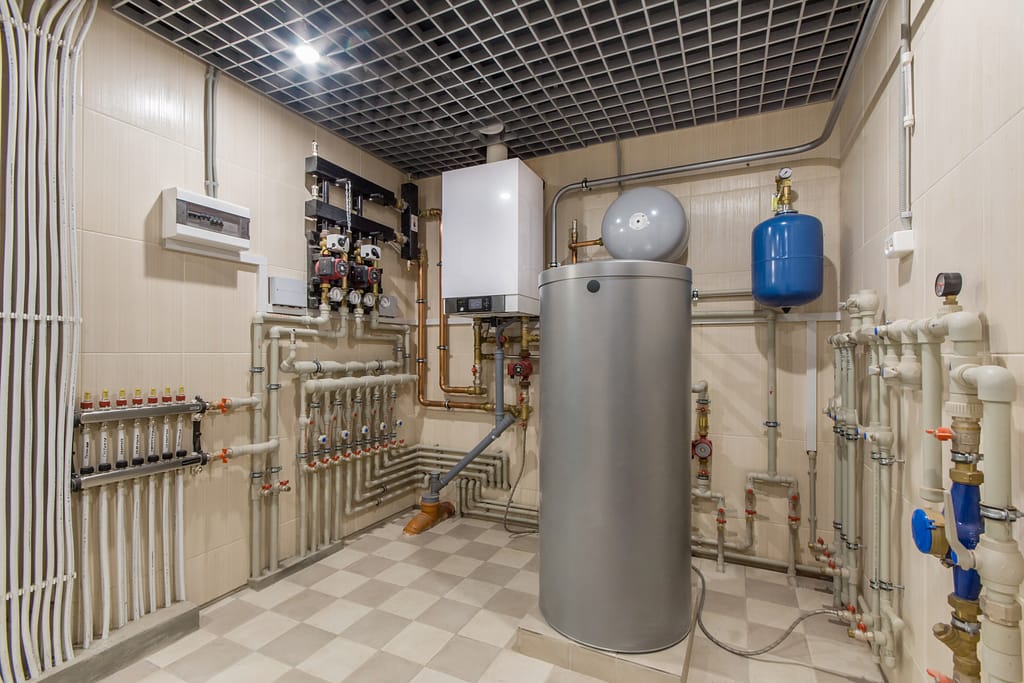 most efficient heating system Hot water boiler. Boiler room with a heating system