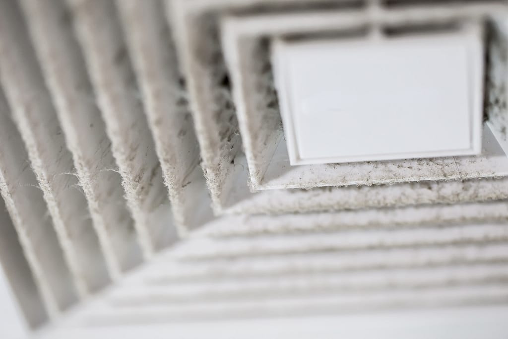 how to clean air ducts Dust out from Air Duct, Danger and the cause of pneumonia in office man.